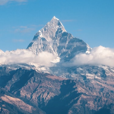 A soaring mountain in the clouds.